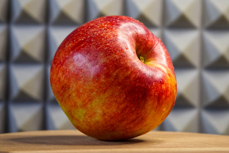 Close-up reveals texture in moist fruit and intricate wall design.の写真素材