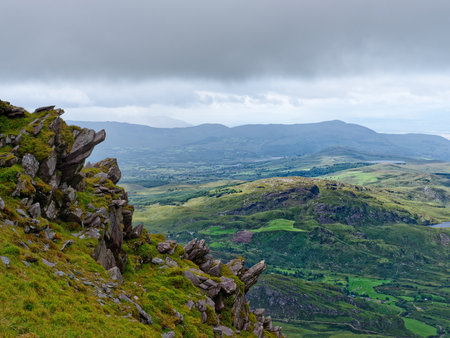 Views from high above the scenic landscape of the Coomloughra Horseshoe trail in County Kerry,...