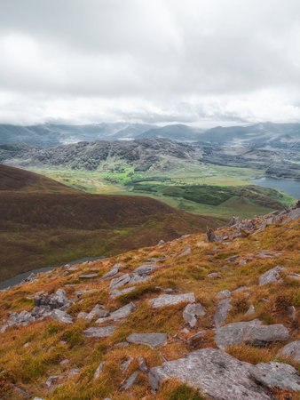 This view is an example of the rugged Irish landscape that can be observed along the Coomloughra...