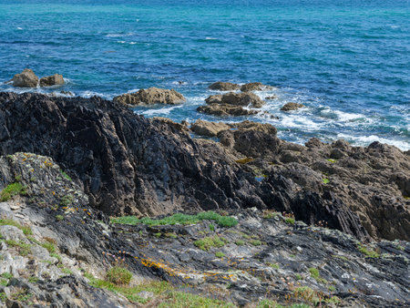 Rocky coastline and clear waters of the Atlantic ocean in scenic West Cork, Ireland.の写真素材
