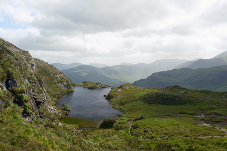 Panoramic view of a stunning mountain range. Peaceful, tranquil, and inspiring nature.の写真素材