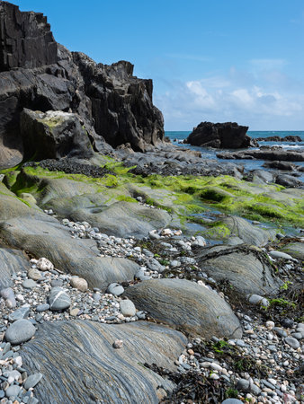 Beautiful coastal scenery with a mix of rock and sea.