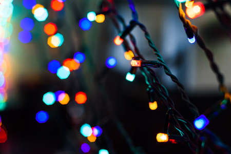 light garland with colorful bokeh in the backgroundの写真素材