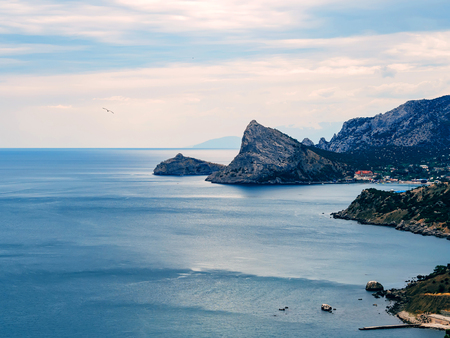 blue landscape with sea and mountainsの写真素材