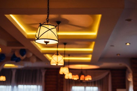 vintage retro chandeliers with luminous lamps