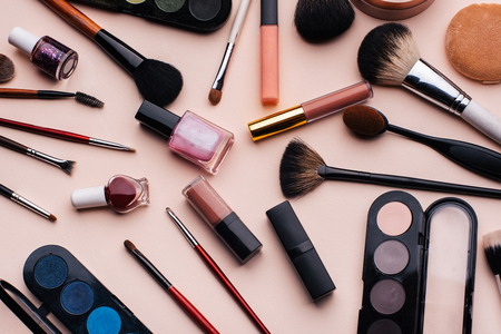 Womens cosmetics and makeup set on pink background. Top viewの写真素材
