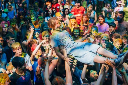 VICHUGA, RUSSIA - JUNE 17, 2018: A crowd of happy people at the celebration of the festival of colors Holiのeditorial素材