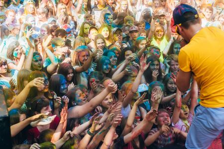 VICHUGA, RUSSIA - JUNE 17, 2018: Crowd of happy people at the celebration of the festival of colors Holiのeditorial素材
