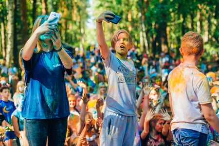 VICHUGA, RUSSIA - JUNE 17, 2018: Happy people at the festival of colors Holiのeditorial素材