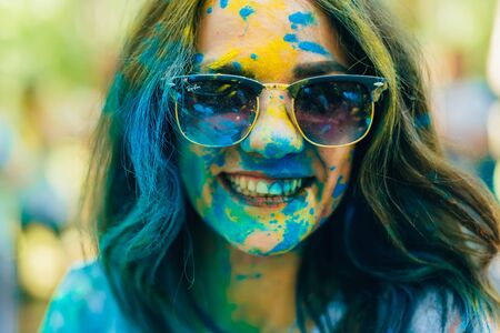 VICHUGA, RUSSIA - JUNE 17, 2018: Festival of colors Holi. Portrait of a young happy girlのeditorial素材