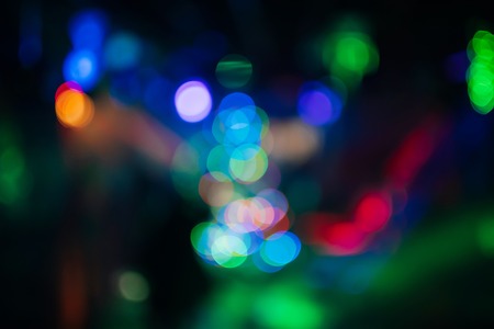 multicolored bokeh from bright colored spotlights in a nightclubの写真素材