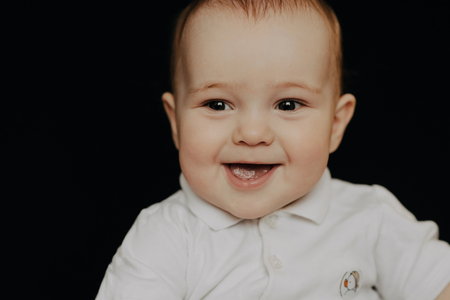 Portrait of a laughing little boy. Caucasian child kidの写真素材
