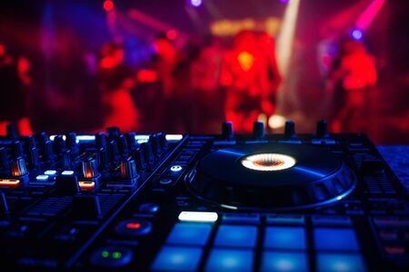professional DJ controller for mixing electronic musicの写真素材