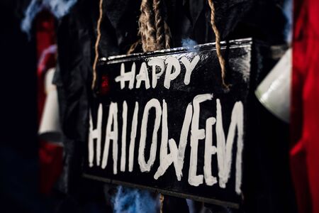 Halloween dark festive lettering with a decorの写真素材