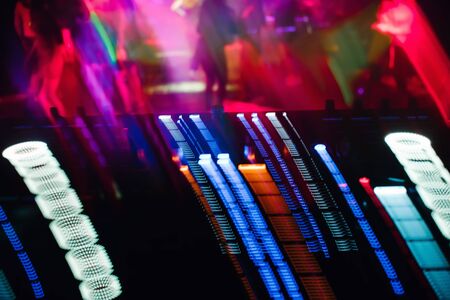 glowing lights from DJ mixer music remoteの写真素材