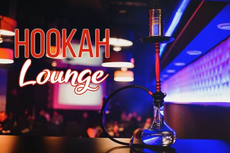 Beautiful hookah on the table in the interior of the restaurant. The concept of the hookah Lounge