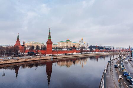 MOSCOW, RUSSIA - FEBRUARY 01, 2020: Urban landscape with views of the Kremlin wall and the Moscow river. The Grand Kremlin Palace, the Archangel Cathedralのeditorial素材