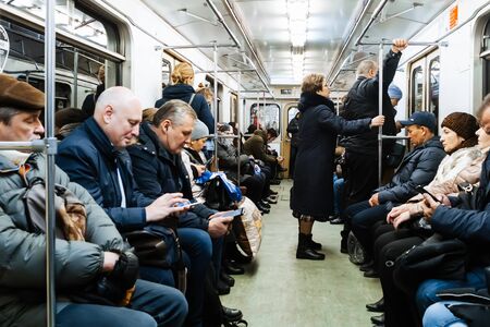 MOSCOW, RUSSIA - JANUARY 31, 2020: A crowd of people inside the train in the Moscow metroのeditorial素材