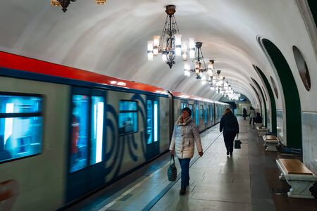 MOSCOW, RUSSIA - JANUARY 31, 2020: Train on the platform in the metro of Moscow and peopleのeditorial素材