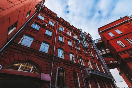 MOSCOW, RUSSIA - FEBRUARY 01, 2020: Red brick walls of old industrial buildings with air...