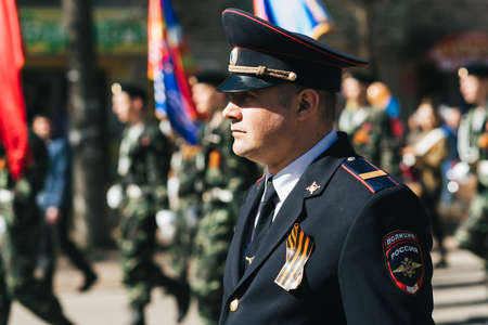 VICHUGA, RUSSIA - MAY 9, 2018: Portrait of man on a March in honor of the victory in world war II