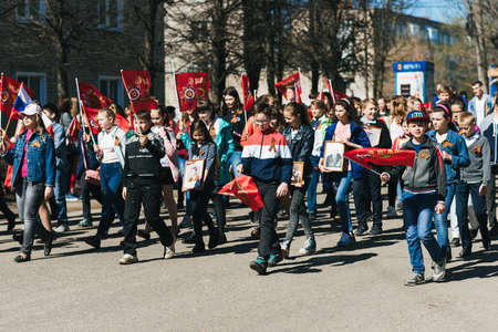 VICHUGA, RUSSIA - MAY 9, 2018: Children at victory parade in honor of world war II. March of immortal regimentのeditorial素材