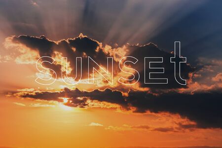 Concept Of Sunset. Clouds in the sky with rays sunの写真素材