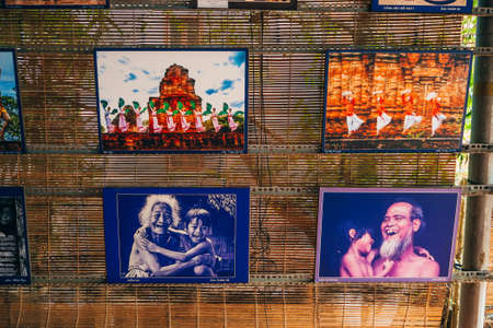 MUI NE, VIETNAM - MARCH 6, 2017: A photo exhibition of portraits of Vietnamese people in traditional dressのeditorial素材