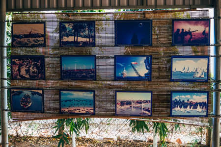 MUI NE, VIETNAM - MARCH 6, 2017: An exhibition of photographs taken in Vietnam on the wallのeditorial素材