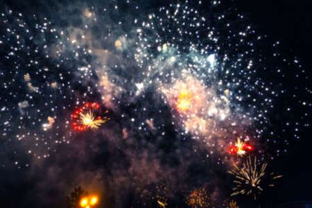 blurred multicolored flashes of fireworks