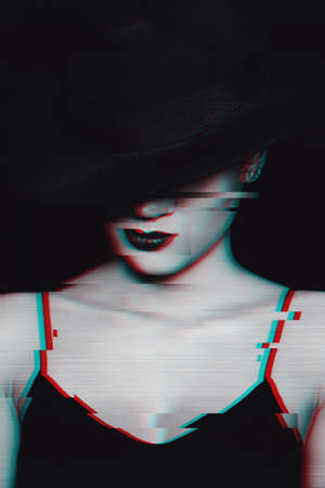 stylish portrait of a young girl in a black dress and hat
