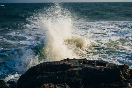 sea with waves and spray from the water