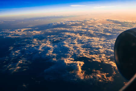 turbine of the plane on the background against cloudy skyの写真素材