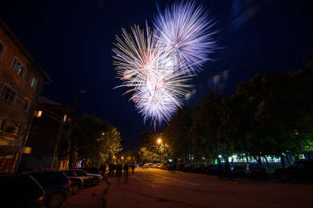 VICHUGA, RUSSIA - JUNE 11, 2016: Colorful explosions of fireworks in the night against the sky on the celebration of the city of Vichugaのeditorial素材