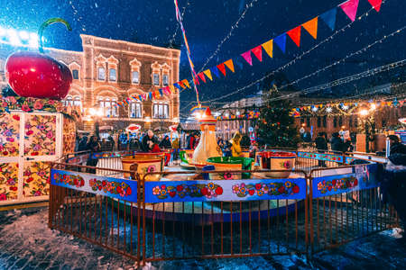 MOSCOW, RUSSIA - JANUARY 31, 2020: Decorated with Christmas decor red square in Moscow with a fair with people at night in winterのeditorial素材