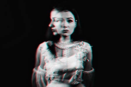 portrait of a mad girl with mental disorders and schizophrenic diseases with blur