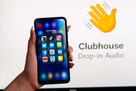 VICHUGA, RUSSIA - FEBRUARY 28, 2021: Smartphone with icons of modern social network applicationsのeditorial素材