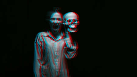 blurry terrible portrait of a ghost witch girl with a dead mans skullの写真素材