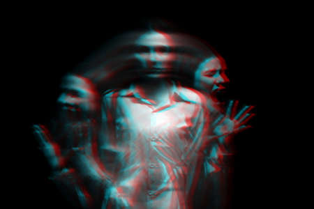 blurry female portrait of a psychotic with bipolar and schizophrenic disordersの写真素材