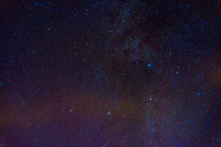 Milky Way in starry sky with nebulae and galaxies. Background with stars and spaceの写真素材