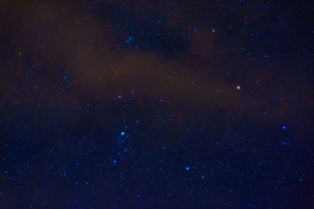 constellation of Orion on background of blue starry sky. Astrophotography of stars, galaxies and...
