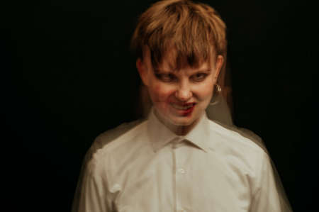 crazy psychopathic girl with mental disorders in straitjacketの写真素材