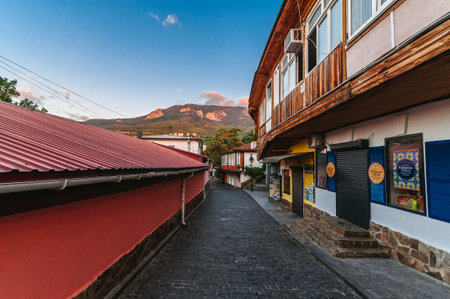 GURZUF, RUSSIA - SEPTEMBER 1, 2021: beautiful ancient cobblestone street with historical buildings in resort of Gurzufのeditorial素材