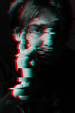 face of man with glitch effect of virtual reality