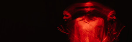 blurry scary portrait of a witch ghost girl in a white shirtの写真素材