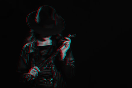 Sexy female dominant mistress with a whip for BDSM sex with submission and domination in a leather raincoatの写真素材