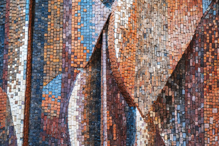 texture of old wall decorated with colorful mosaics close upの写真素材