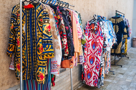arab silk dresses with a colorful pattern in oriental street bazaar in Turkey in Istanbulの写真素材