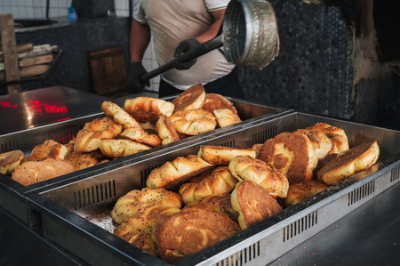 freshly baked traditional Central Asian flatbread on counter in tandoor bakery close-up. Traditional...