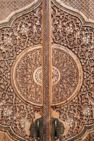 oriental asian pattern Uzbek ornament on wooden carved door in Museum of Political Repression in Tashkent in Uzbekistan close-upの写真素材